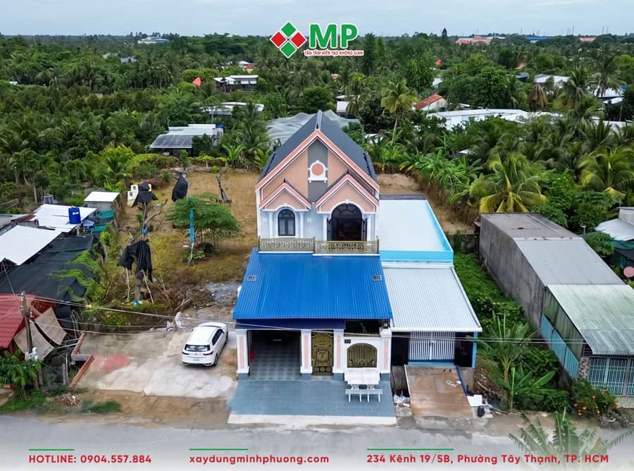 BÀN GIAO BIỆT THỰ 2 TẦNG TÂN CỔ ĐIỂN 8X17M ĐỒNG THÁP - BG09 1 Góc toàn cảnh biệt thự 2 tầng mái Thái 8x17,2m tại Tiền Giang nổi bật giữa không gian xanh mát.