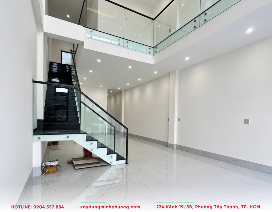 Bàn Giao Nhà Phố Gác Lửng Hiện Đại 5x17m Tại An Giang - BG25 4 Phòng khách nhà phố có gác lửng rộng rãi, thoáng đãng